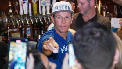 Image for story: Mark Wahlberg serves tequila at Florida restaurant to raise money for Maui victims