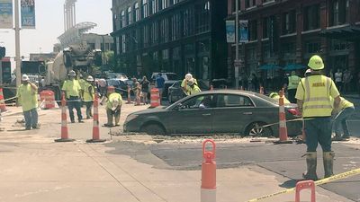 Image for story: Photos: Driver gets stuck in wet cement in downtown Cleveland