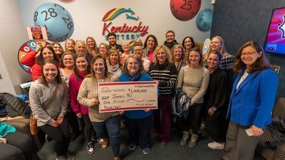 Image for story: Group of Kentucky middle school employees celebrate $1 million Powerball prize