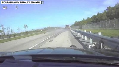 Image for story: Dashcam captures moment truck slams into Florida Highway Patrol car