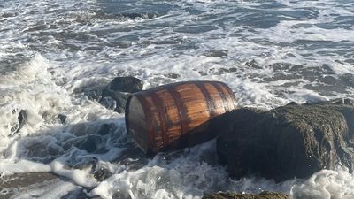 Image for story: MYSTERY: Wood barrels and more washing up on California Central Coast beaches