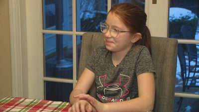 Image for story: Girl, 10, reacts to DNA test results for Santa Claus, reindeer