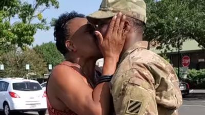 Image for story: Mom overjoyed as soldier son surprises her after 7-month deployment