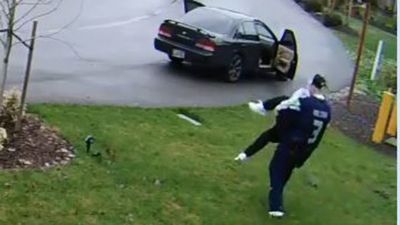 Image for story: Arrested: Suspected porch pirates caught on cam making awkward getaway 