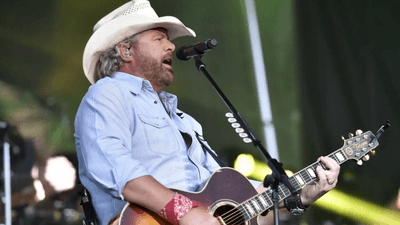 Image for story: Country singers mourn Toby Keith: 'Up there playing his guitar with other legends'