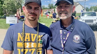 Image for story: VIDEO: Navy Officer honored with parade after 20 years of service