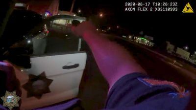 Image for story: Police release bodycam video of shots fired at patrol car