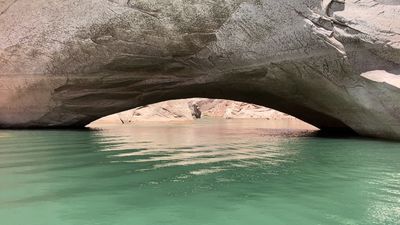 Image for story: Shrinking water levels at large US reservoir reveal natural wonders hidden for decades 