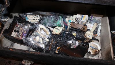 Image for story: Dentist accused of torching boxes of medical masks in attempt to destroy office