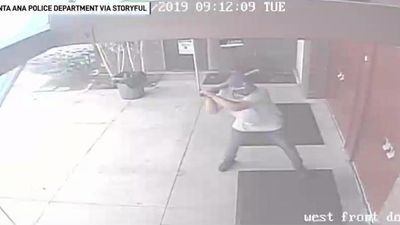 Image for story: Man arrested after smashing through doors of California church