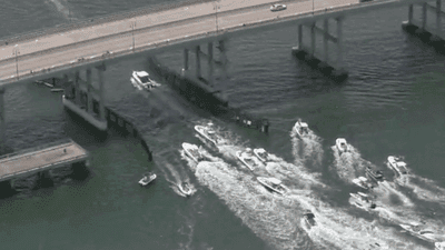 Image for story: Boaters hold parade on the water in support of President Trump