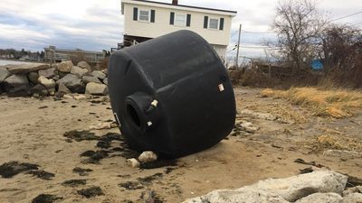 Image for story: What is it and where did it come from? Mystery object washes ashore in Warwick