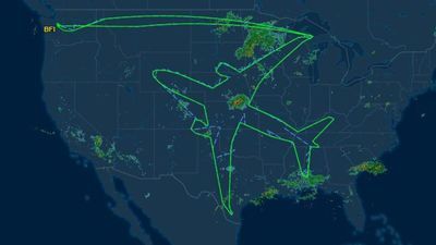 Image for story: Photo: Boeing test flight path outlines 787 on US