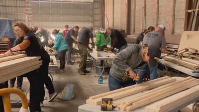 Image for story: Volunteers build hundreds of beds for Michiana children in need