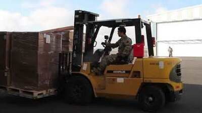 Image for story: California National Guard packs and ships 500 ventilators to New York and other states