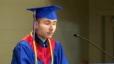 Image for story: Blind student graduates as valedictorian of Ohio high school