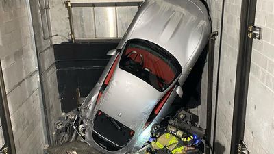 Image for story: Elevator malfunction leaves Ferrari hanging at 'high-end' dealership in Florida