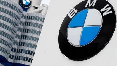 Image for story: BMW profit hit by anti-trust case, spending on technology