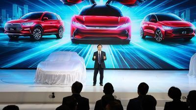 Image for story: Electric car makers woo Chinese buyers with range, features