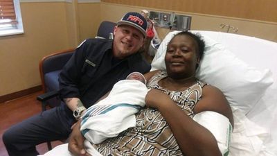 Image for story: PG County EMT who was born in ambulance delivers baby in ambulance on his birthday