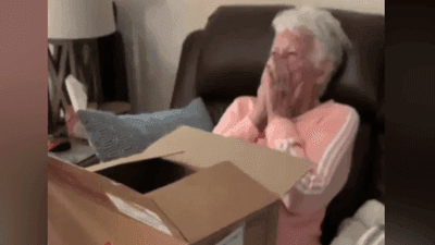 Image for story: Grandma gets surprised by a puppy