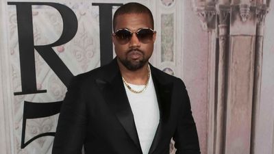 Image for story: Report: Kanye West covers college tuition for daughter of George Floyd, donates $2 million