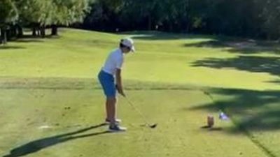 Image for story: VIDEO: 12-year-old boy sinks hole-in-one at golf tournament