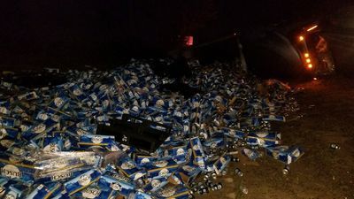 Image for story: Truck driver spills 60,000 pounds of beer on I-10 in Florida