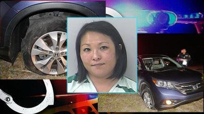 Image for story: Woman drives car with 4 flat tires, charged with DUI: Police