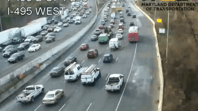 Image for story: Tractor-trailer crash spills 20,000 pounds of cheese balls on highway