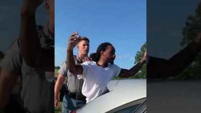 Image for story: Black man grabbed by neck as Mississippi traffic stop turns violent