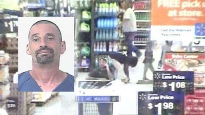 Image for story: Man tries to sneak 58-inch TV out of Walmart during shop-with-a-cop event