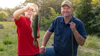 Image for story: Blake Shelton takes foster children fishing on his farm