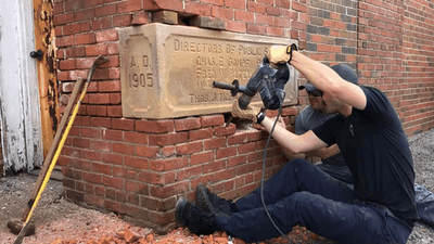 Image for story: 118-year-old time capsule found in old Ohio fire station opened