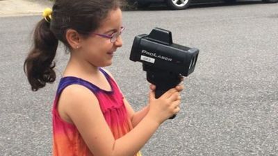 Image for story: 7-year-old girl teams up with police to stop speeders