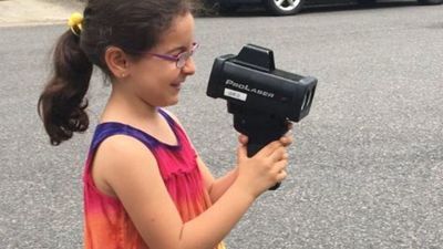 Image for story: 7-year-old girl teams up with police to stop speeders