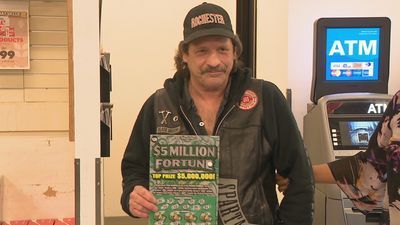 Image for story: Man wins $5 million  prize from gas station lottery ticket