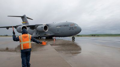 Image for story: Air Force crew delivers much-needed COVID-19 supplies, medics to New York