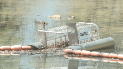 Image for story: 'Litter Gitter' device clearing trash from waterways in Alabama