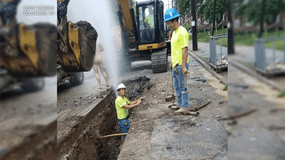 Image for story: Caught on Camera: Guy showers in street after broken water main interrupts his morning