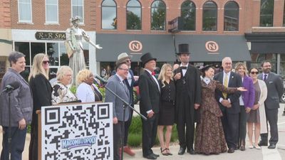 Image for story: Illinois city unveils life-size Monopoly game board in tribute to local creator