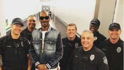 Image for story: All smiles as Snoop Dogg poses with Kent PD