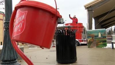 Image for story: Man camps in giant kettle until Salvation Army reaches goal