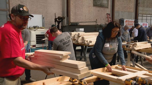 Volunteers spent their Saturday at the Studebaker Factory constructing beds to give to Michiana children in need. (WSBT)