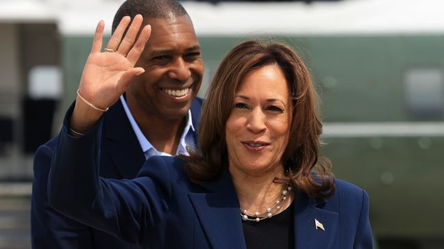 Vice President Kamala Harris waves before boarding Air Force Two as she departs on campaign travel to Milwaukee Tuesday, July 23, 2024 at Andrews Air Force Base, Md.  (Kevin Mohatt/Pool via AP)