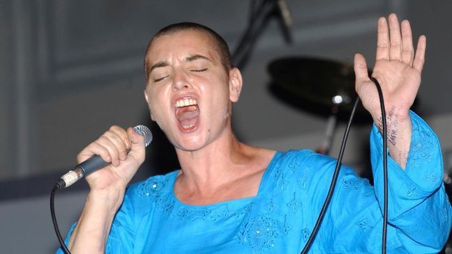 FILE - Irish singer Sinead O'Connor performs at the Prime Minister Independence Gala in Kingston, Jamaica on Aug. 6, 2005.{&nbsp;} (AP Photo/Collin Reid, File)