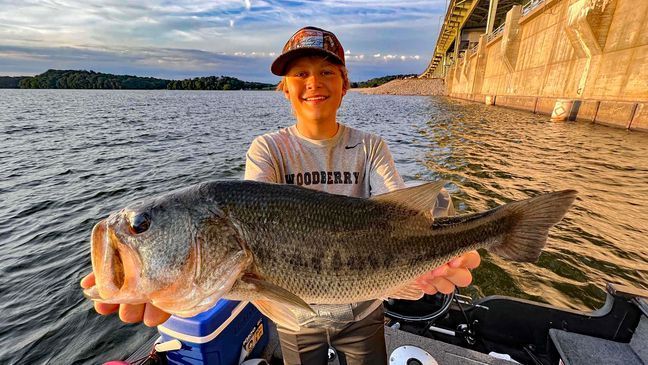 Edwards Tarumianz actually caught a variety of fish before he caught the rare white cat, including this hefty largemouth bass. (Photo: Richard Simms)