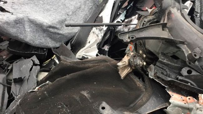 In this Friday, May 11, 2018, photo released by the South Jordan Police Department shows a traffic collision involving a Tesla Model S sedan with a Fire Department mechanic truck stopped at a red light in South Jordan, Utah. Witnesses indicated the Tesla Model S did not brake prior to impact. Police Sgt. Samuel Winkler said the car's air bags were activated and that the Tesla's 28-year-old driver suffered a broken right ankle, while the driver of the mechanic truck didn't require treatment. Police in a Salt Lake City suburb say it's not immediately known whether a Tesla Model S sedan's semi-autonomous Autopilot driving system was in use when it rear-ended a truck apparently without braking before impact at approximately 60 mph. (South Jordan Police Department via AP)