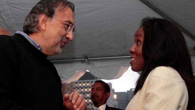 In this 2012 photo,{&nbsp;}Sergio Marchionne, who also served as United Way for Southeastern Michigan’s Campaign Chair, speaks with Yolanda Washington, a local resident, whose life and family were positively influenced by United Way’s 2-1-1 service. (Image courtesy of Fiat Chrysler Automobiles)