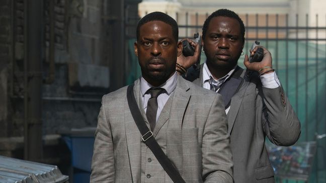 Sterling K. Brown and Brian Tyree Henry in "HOTEL ARTEMIS." (Matt Kennedy/Global Road Entertainment)